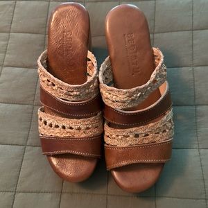 Brown leather clogs